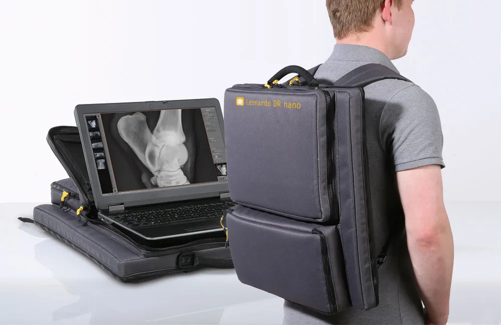 A veterinarian with the Leonardo DR nano on his back