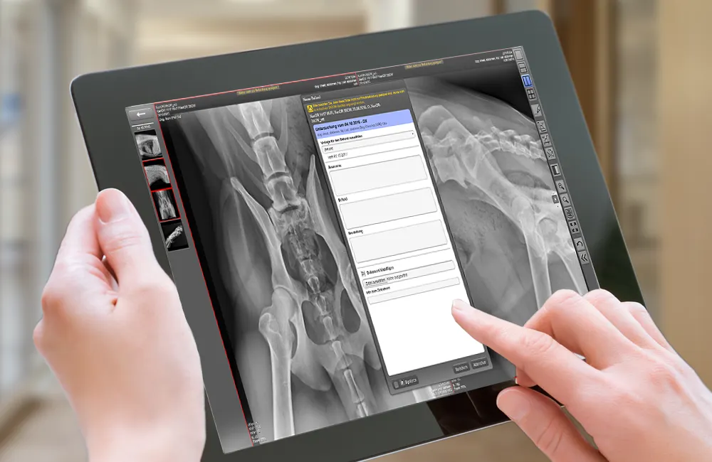 A tablet with the dicomPacs veterinary software running on it